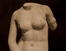 sculptural stone torso-human created art object